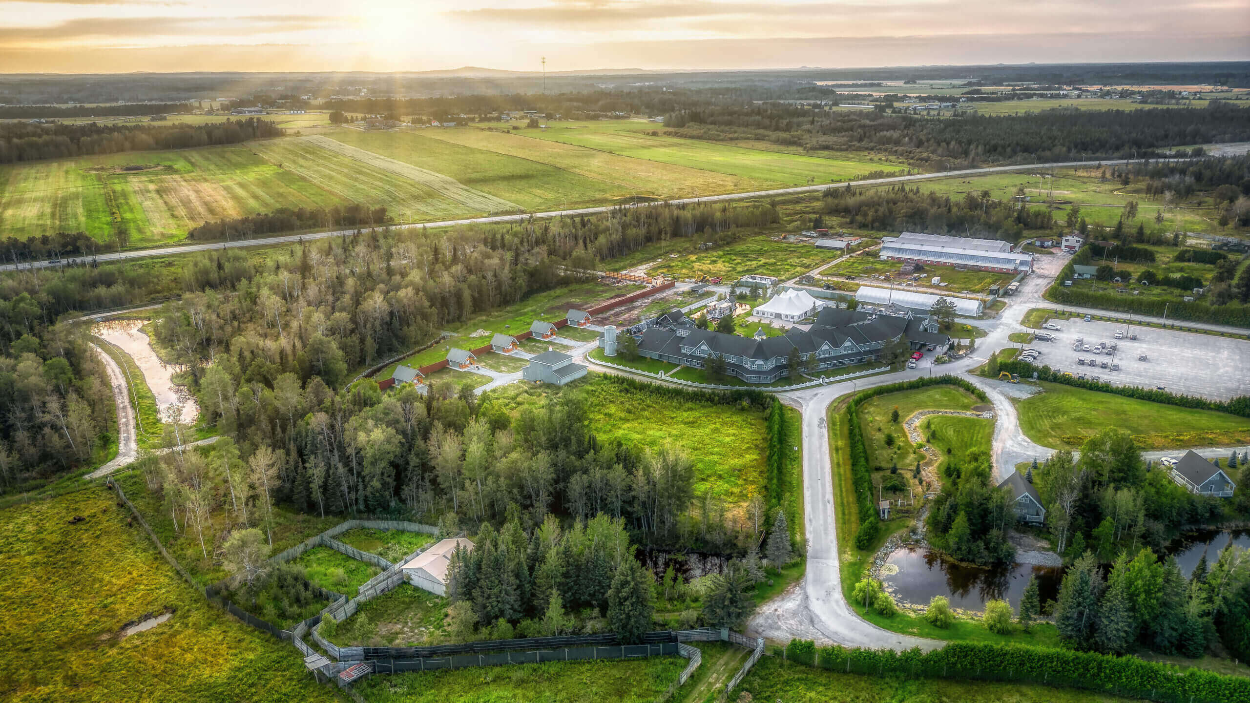 Sleeping With The Wolves An aerial view of Cedar Meadows farm in the countryside. Cedar Meadows, Timmins, Ontario